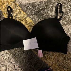 Victoria secret sports bras .1/black. .1/green black .1 pink& some clothes.